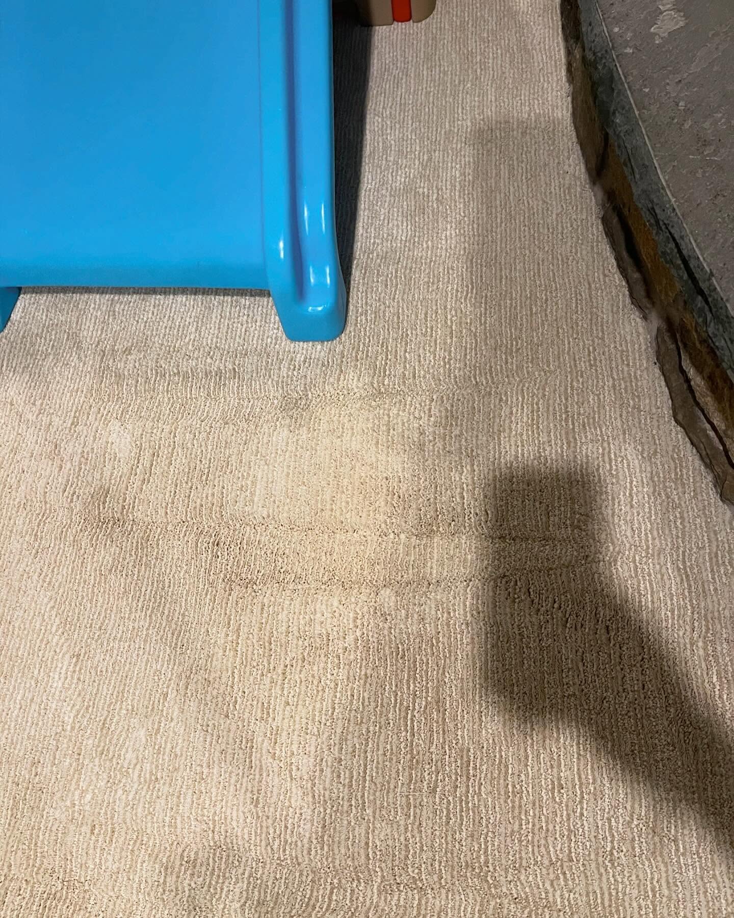 The same playroom carpet after treatment with the red dye stain completely gone
