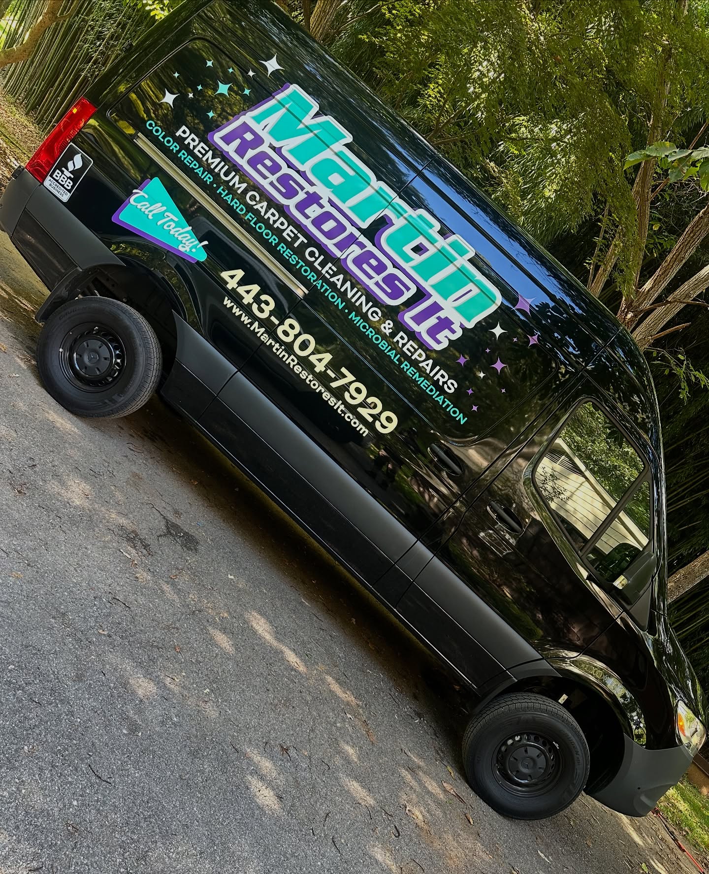 Side of the Martin Restores It branded Sprinter van